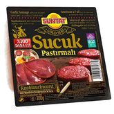 A 300g pack of Suntat Gold Seri Pastirmali Sucuk (Halal), with images of sliced sausage and multilingual product details.